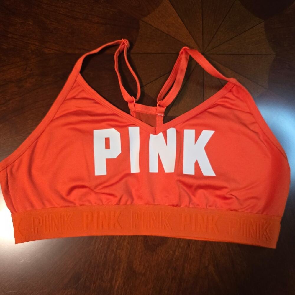 PINK Sports Bra Athletic Apparel Orange and has padding size med